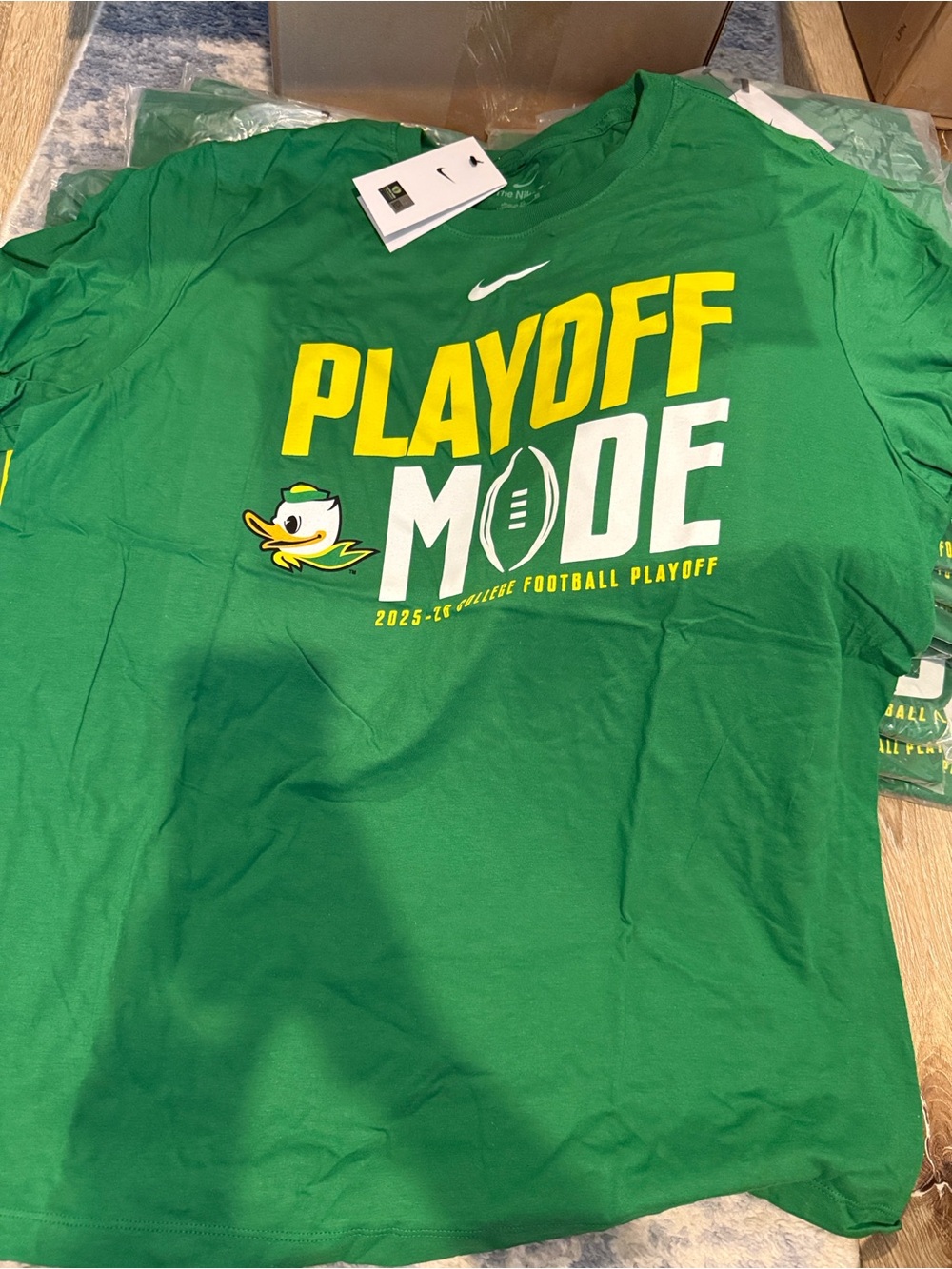 Nike Green T-Shirt with White Swoosh and Yellow Graphic